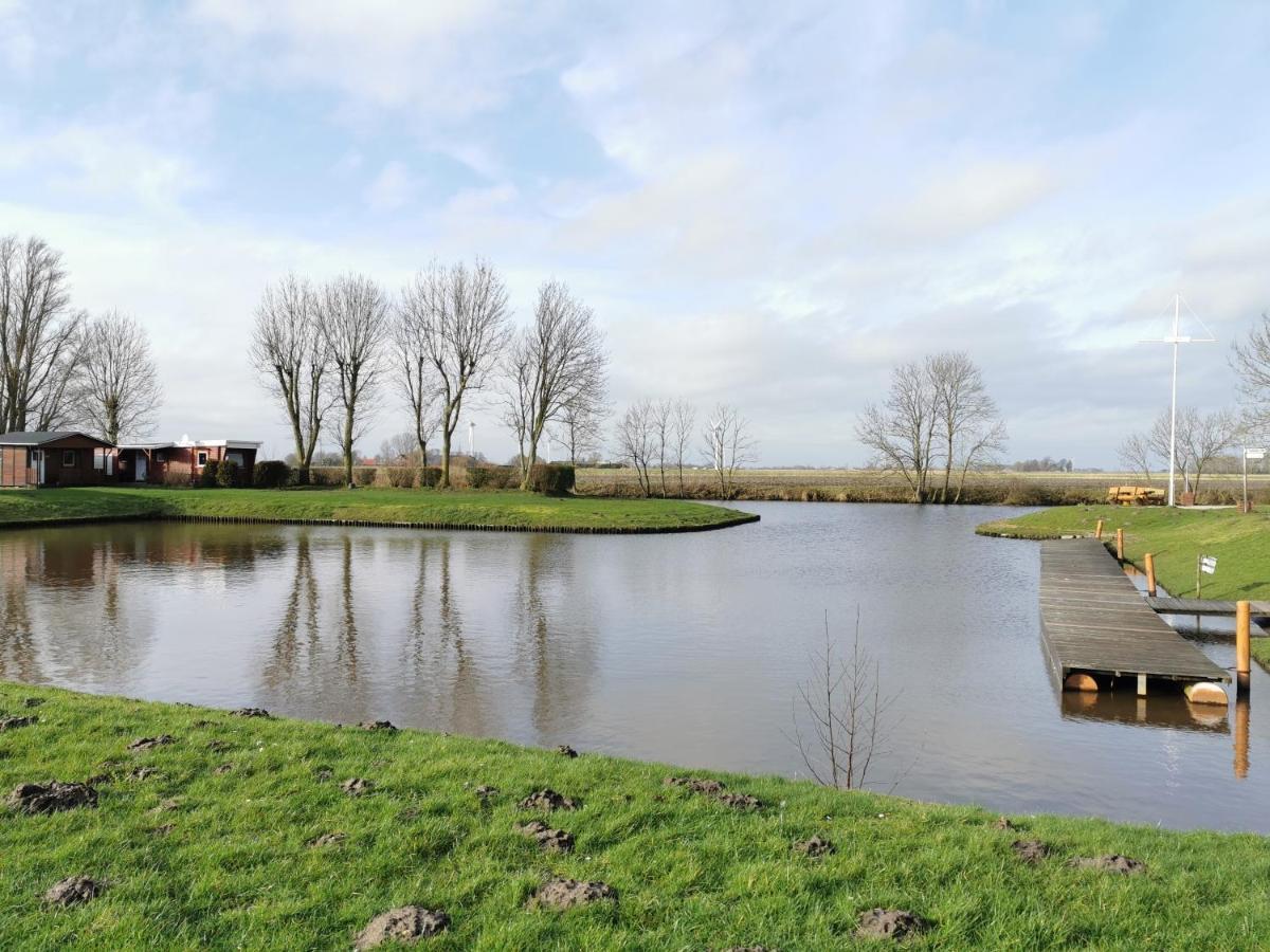 Ferienglück an der Nordsee: Erdgeschoss-Ferienwohnung mit Kamin und Garten Altfunnixsiel Exterior photo